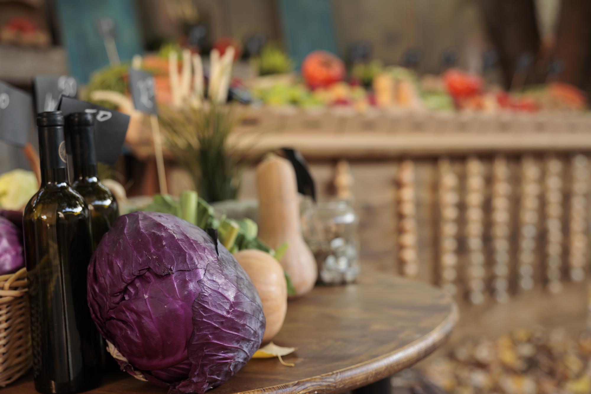 Local market produce laid out on wooden table